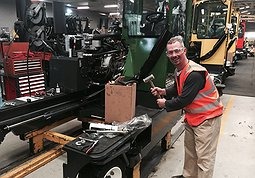 Greg at the Combilift Factory working on the assembly line